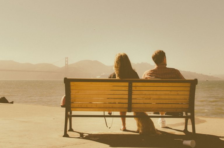 loneliness-in-marriage-couple-sitting-on-bench